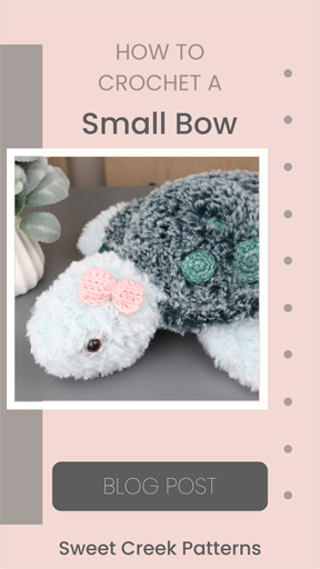 Crochet Bow on crochet amigurumi sea turtle for the modern baby nursery