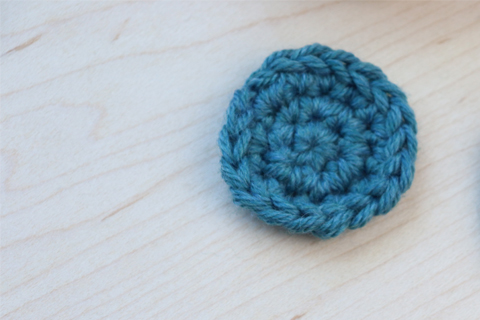 small teal crochet circle for embellishments