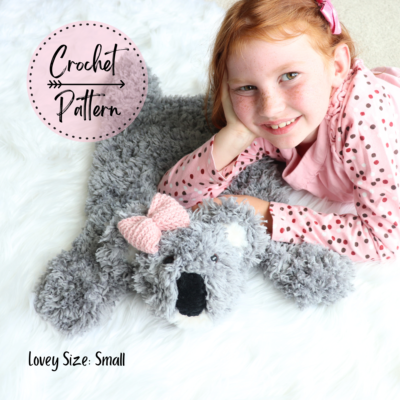 Crochet Small Koala Bear with girl laying on it
