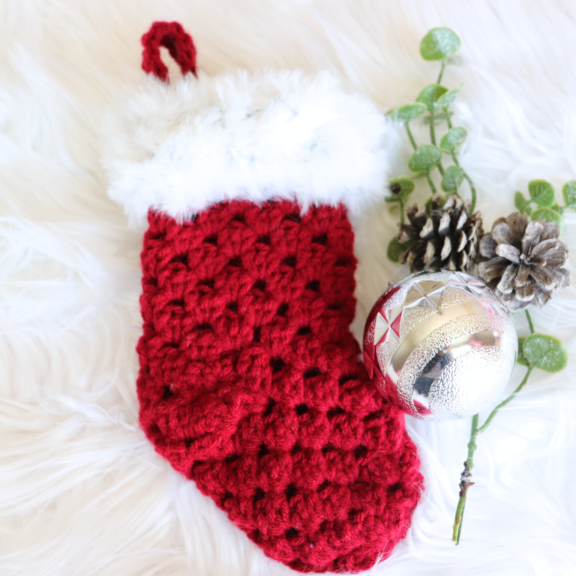 crochet mini stocking on desk