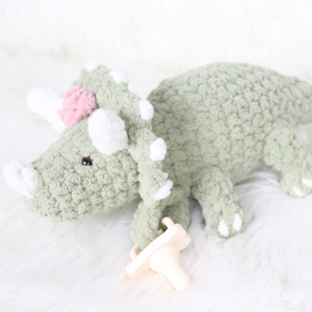 crochet triceratops on desk