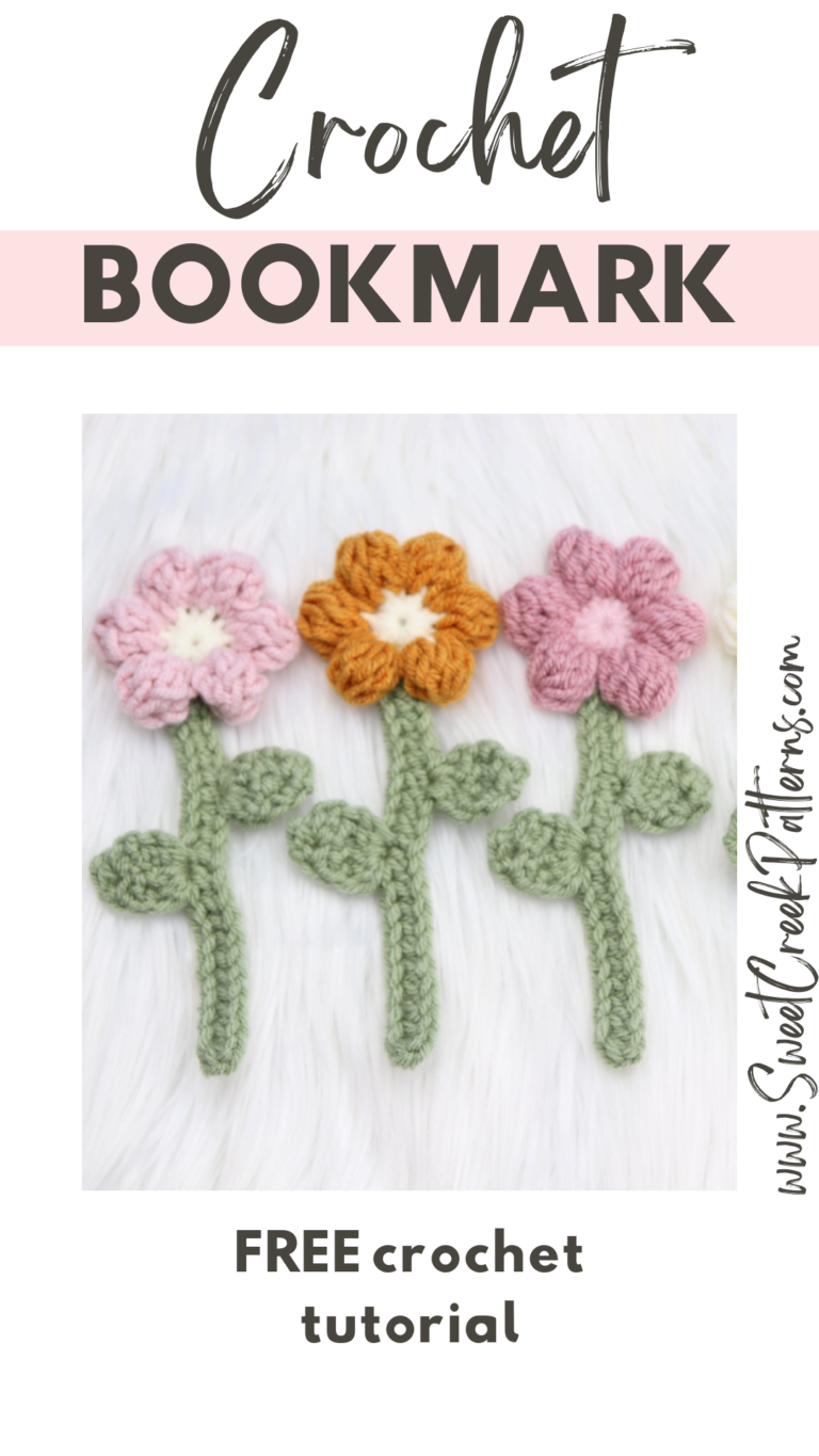crochet flower bookmark laying on desk
